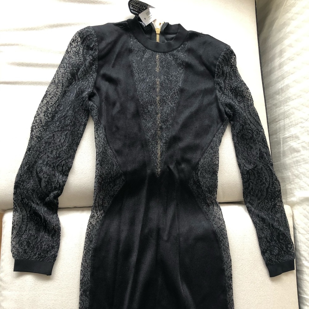 Balmain mesh panel black cocktail dress.